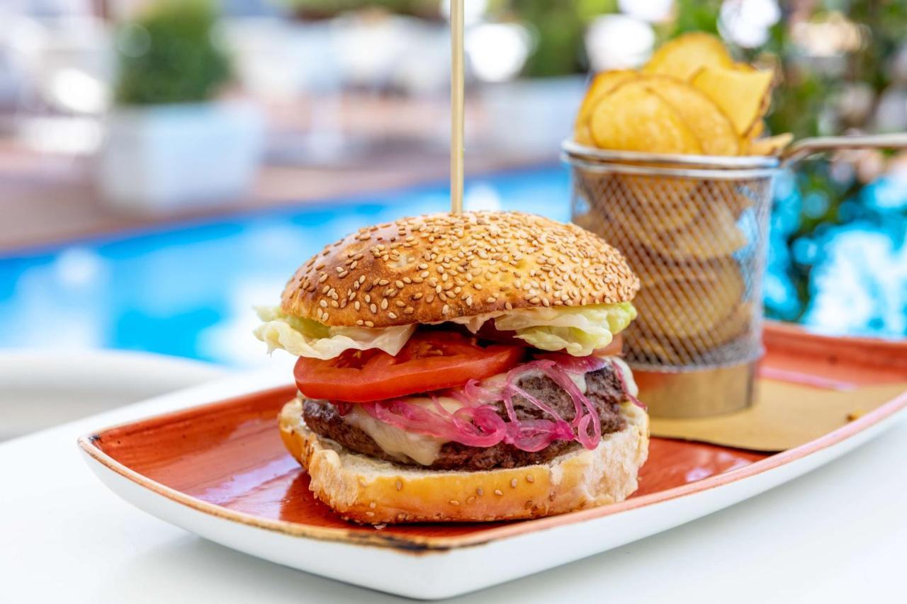 Radisson Blu Es. Hotel, Roma Eksteriør bilde A cheeseburger