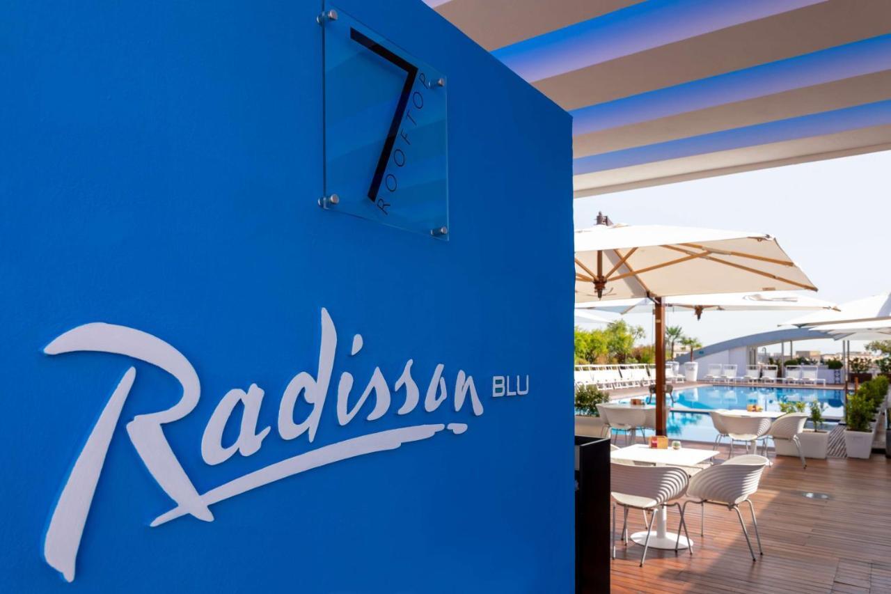 Radisson Blu Es. Hotel, Roma Eksteriør bilde Radisson Blu logo